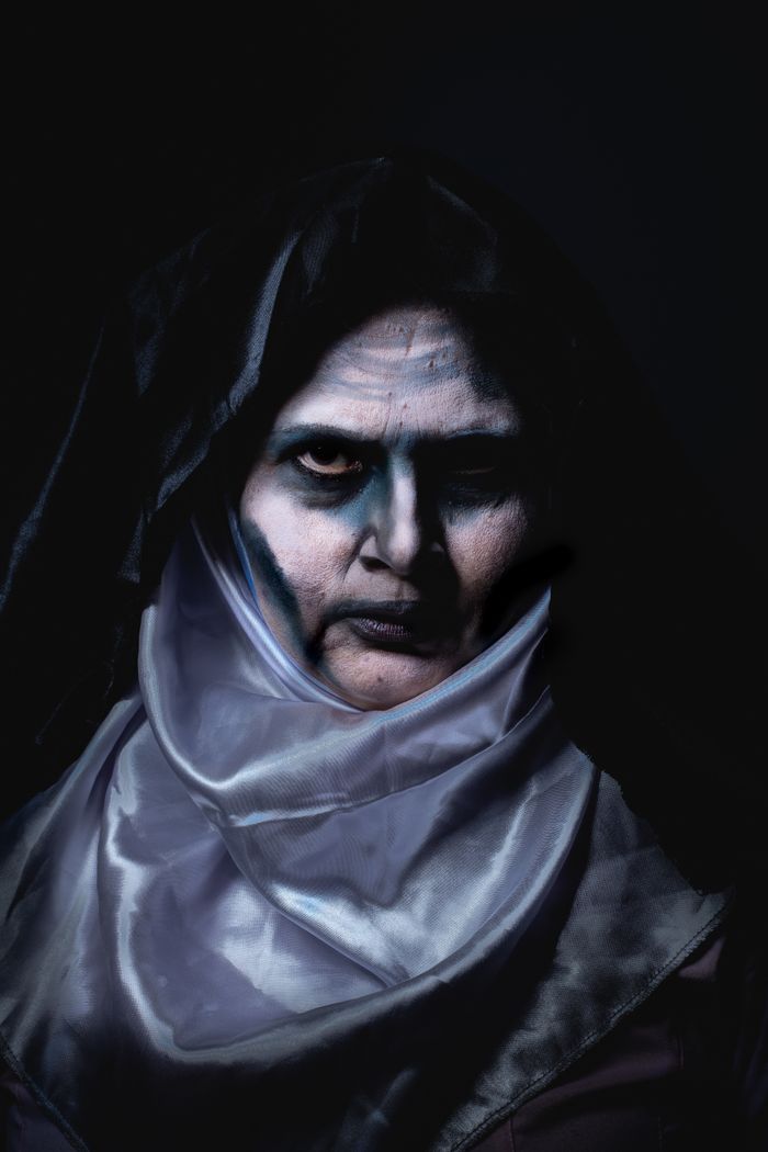 Dramatic portrait capturing a woman in a spooky theme, perfect for Halloween themes.